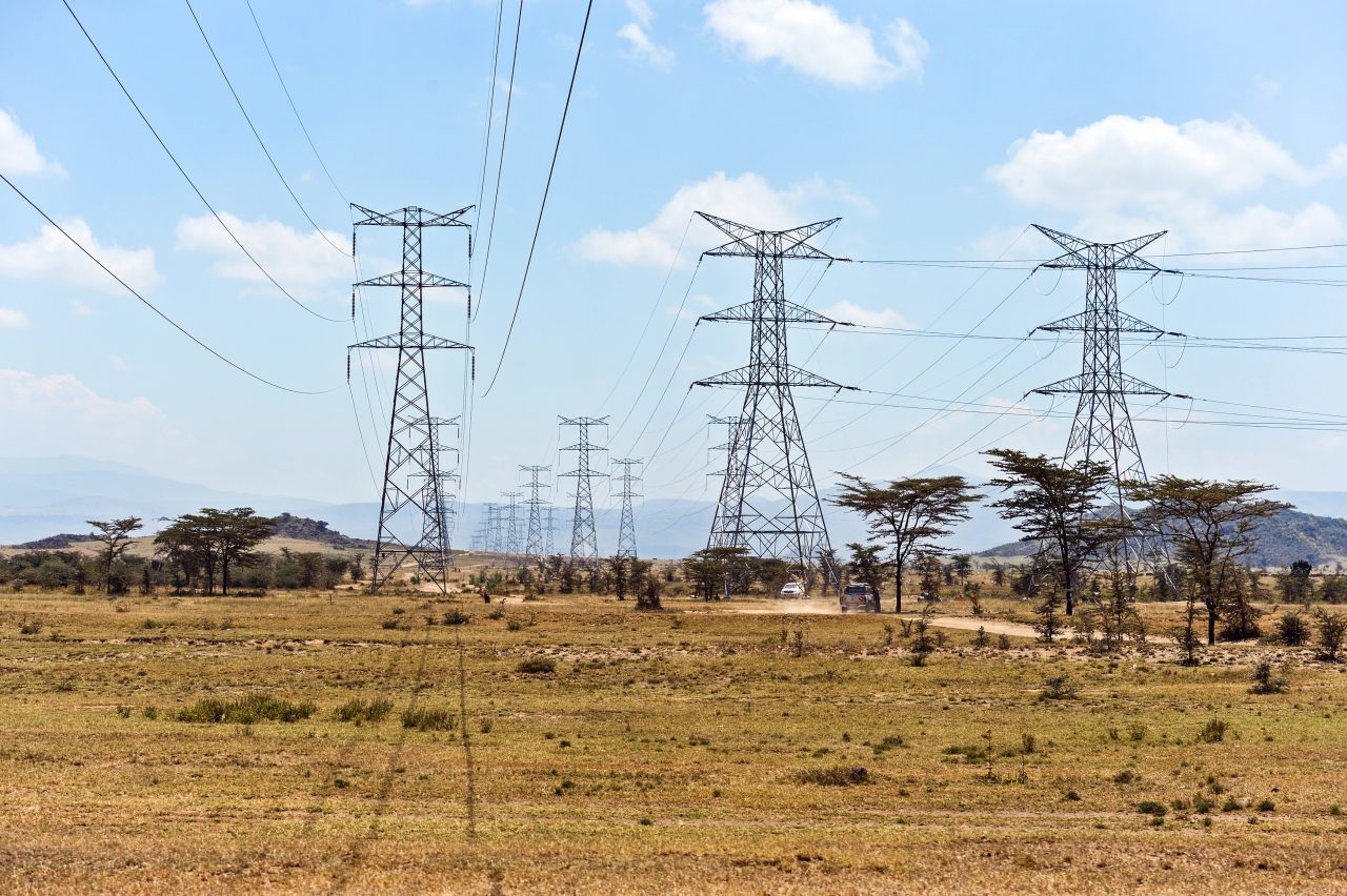 Electricity transmission towers and power lines across the landscape
