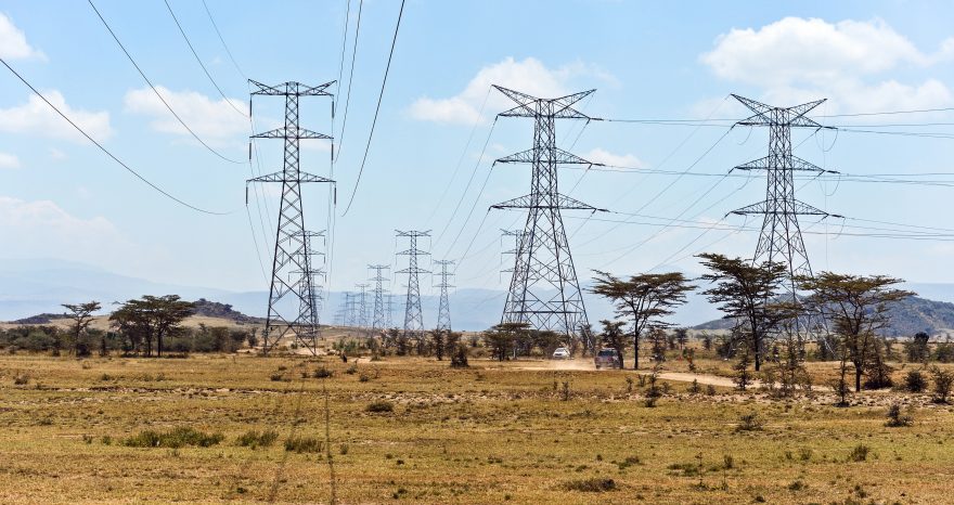 Rinnovabili • Electricity transmission towers and power lines across the landscape